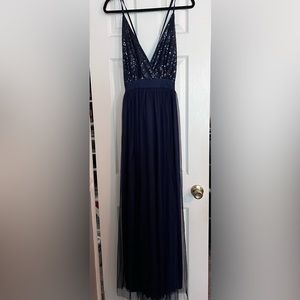 Beautiful navy blue formal dress with sequined accented top, tulle overlay